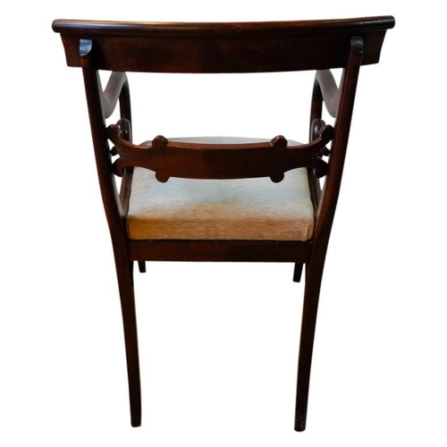 64 - PAIR OF REGENCY MAHOGANY ARMCHAIRSCIRCA 1815the bar backs with downswept scroll arms above Trafalgar... 