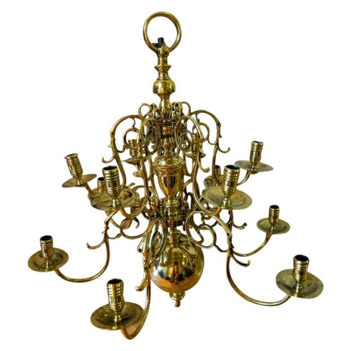 100 - NEAR PAIR OF DUTCH TWELVE-LIGHT BRASS CHANDELIERS19TH CENTURYthe multi-baluster shaft issuing two ti... 