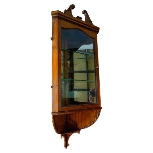 67 - PAIR OF EDWARDIAN SATINWOOD HANGING CORNER CABINETSCIRCA 1910in the George III style, the broken swa... 