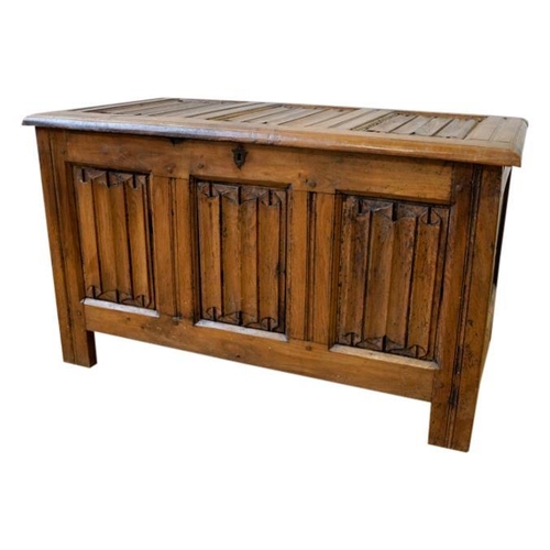 77 - FRENCH GOTHIC CARVED OAK COFFER17TH CENTURYwith a triple linen fold panelled lid and conforming fron... 