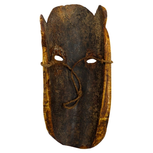 404 - AN AFRICAN IVORY TRIBAL MASK FROM ZAIRE, late 19th century, decorated with drilled roundels and zig-... 