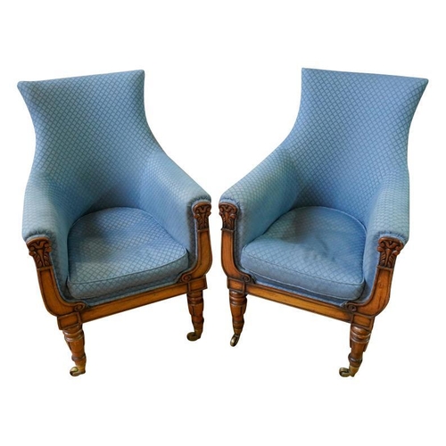 82 - A PAIR OF REGENCY MAHOGANY AND UPHOLSTERED LIBRARY CHAIRSCIRCA 1820covered in patterned blue fabric,... 