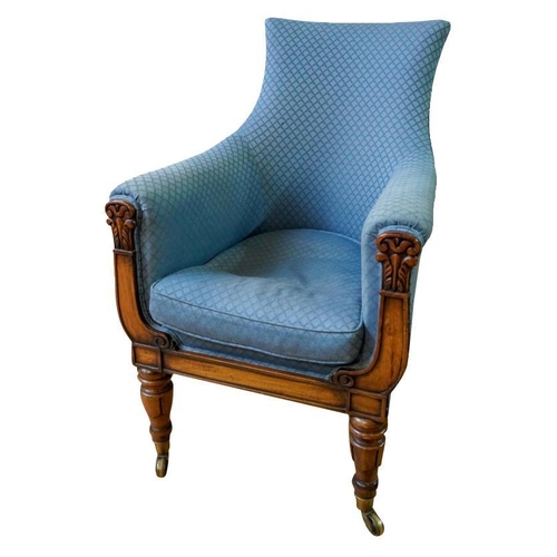 82 - A PAIR OF REGENCY MAHOGANY AND UPHOLSTERED LIBRARY CHAIRSCIRCA 1820covered in patterned blue fabric,... 