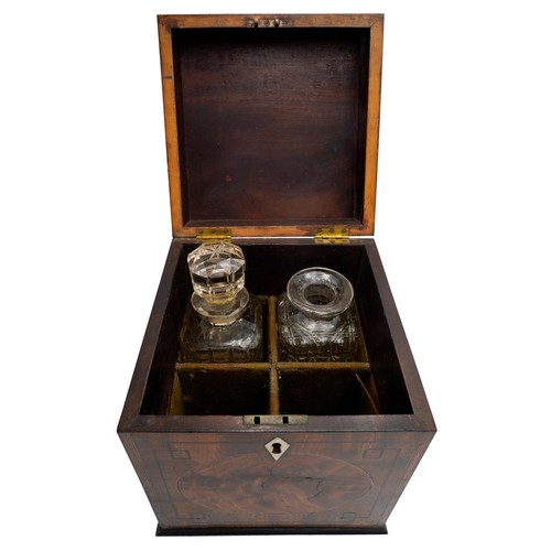 444 - AN EARLY 19TH CENTURY MAHOGANY DECANTER BOX, with ebony and line inlaid panels fielded with roundels... 