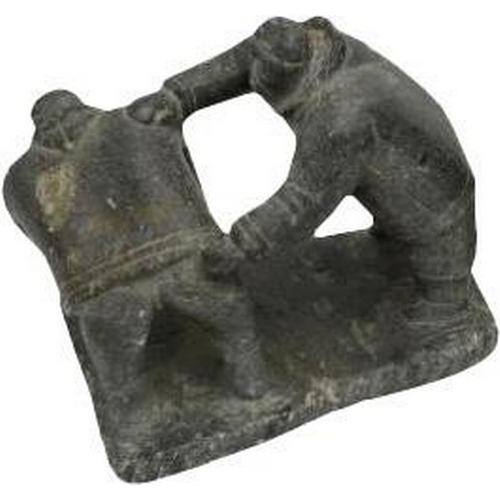 405 - A GOOD INUIT SOAPSTONE CARVING OF TWO WRESTLING FIGURES, the base inscribed with an indistinct sylla... 