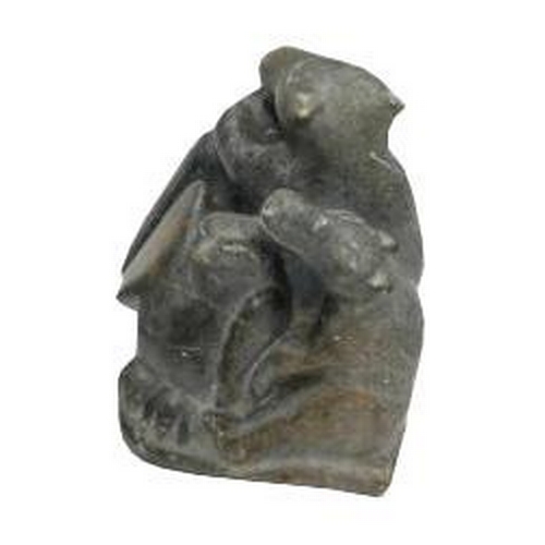 407 - A GOOD INUIT POLISHED SOAPSTONE CARVING OF A GROUP COMPRISING TWO BEARS AND TWO BIRDS, the base with... 