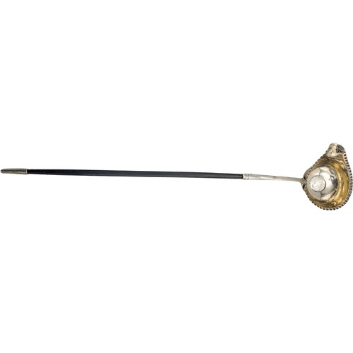 509 - GEORGIAN SILVER AND HORN HANDLED PUNCH LADLE18TH CENTURYinset with a coin38cm longPROVENANCE : Priva... 