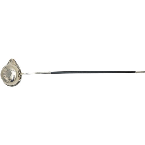 509 - GEORGIAN SILVER AND HORN HANDLED PUNCH LADLE18TH CENTURYinset with a coin38cm longPROVENANCE : Priva... 