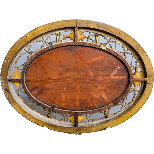 84 - VICTORIAN GILTWOOD AND GESSO OVAL WALL MIRROR19TH CENTURYthe oval plate within an ornate openwork fr... 