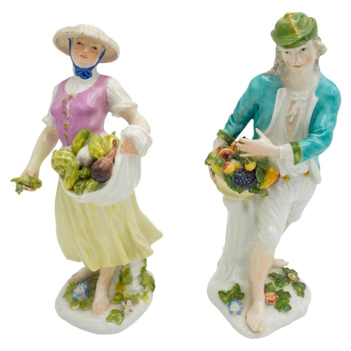 202 - PAIR OF 18TH CENTURY MEISSEN FIGURES OF VEGETABLE SELLERSCIRCA 1740the lady holding vegetables gathe... 