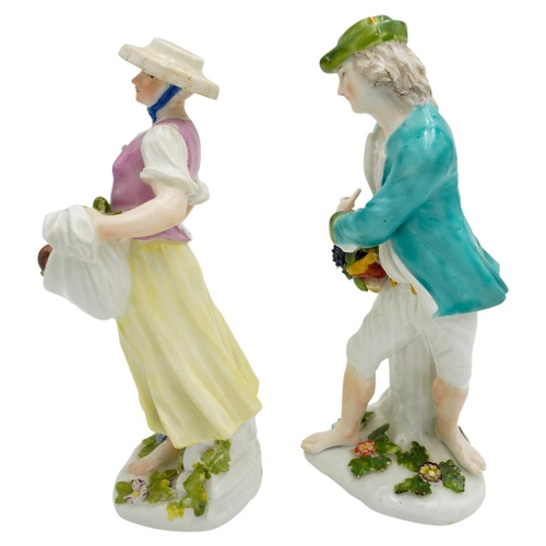 202 - PAIR OF 18TH CENTURY MEISSEN FIGURES OF VEGETABLE SELLERSCIRCA 1740the lady holding vegetables gathe... 