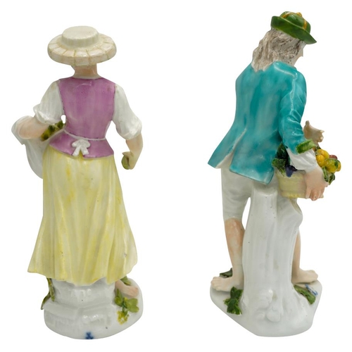 202 - PAIR OF 18TH CENTURY MEISSEN FIGURES OF VEGETABLE SELLERSCIRCA 1740the lady holding vegetables gathe... 