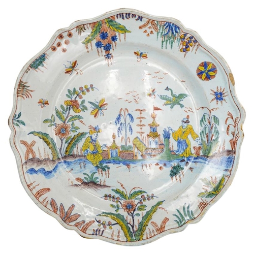 205 - RARE SINCENY OR ROUEN CHIONOISERIE DECORATED FAIENCE DISH CIRCA 1740decorated with a scene of two fi... 