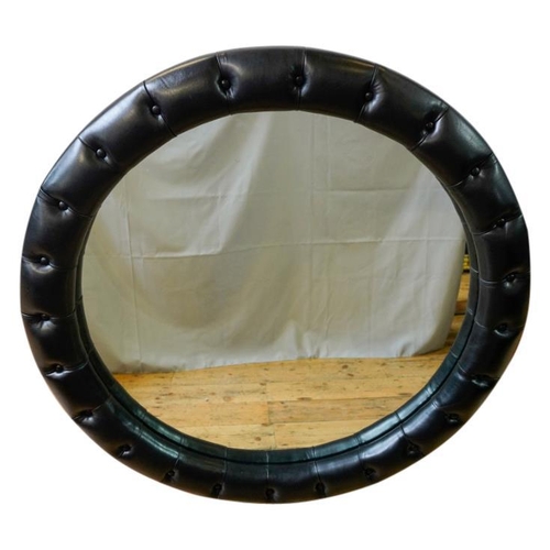 87 - UNUSUAL BUTTONED BLACK LEATHER WALL MIRRORCIRCA 1940'S117cm diamPROVENANCE: Private London Collectio... 