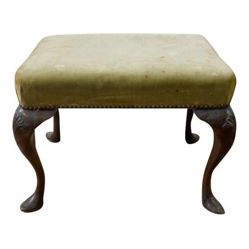 89 - GEORGE II STYLE MAHOGANY FOOT STOOL19TH CENTURYthe padded seated raised on shell carved cabriole leg... 