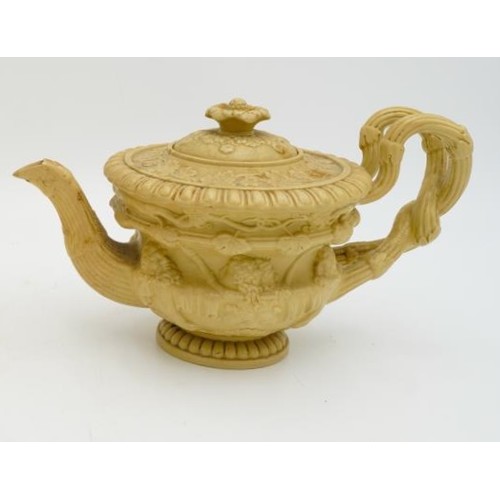 207 - RARE CANEWARE TEAPOT IN THE FORM OF A WARRICK VASE19TH CENTURYthe sides decorated in relief with Bac... 