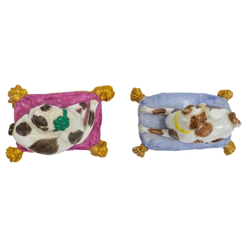 208 - TWO CONTINENTAL FIGURES OF PUGS 19TH CENTURYafter models by Joeach shown recumbent on plush tasselle... 