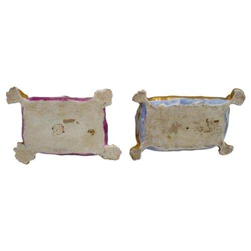 208 - TWO CONTINENTAL FIGURES OF PUGS 19TH CENTURYafter models by Joeach shown recumbent on plush tasselle... 