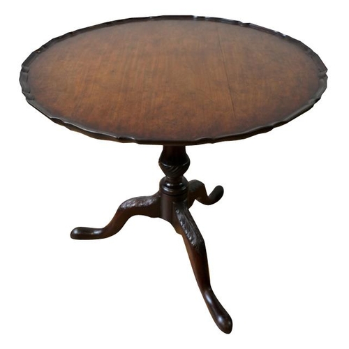 91 - GEORGE III STYLE MAHOGANY TRIPOD TABLE19TH CENTURYthe circular top with a piecrust edge, raised on a... 