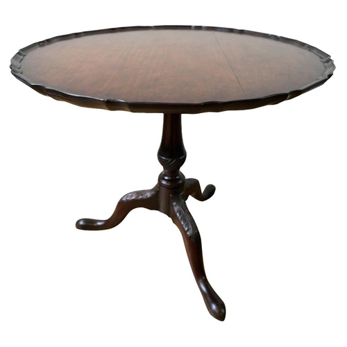 91 - GEORGE III STYLE MAHOGANY TRIPOD TABLE19TH CENTURYthe circular top with a piecrust edge, raised on a... 