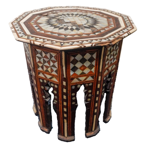 94 - A PERSIAN HEXAGONAL TABLE, CIRCA 1900, inlaid  with bone and mother of pearl and various woods, the ... 