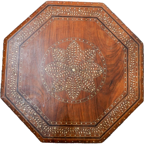 95 - AN INDIAN OCTAGONAL TABLE, EARLY 20TH CENTURY, inlaid with bone, the folding detachable base also wi... 