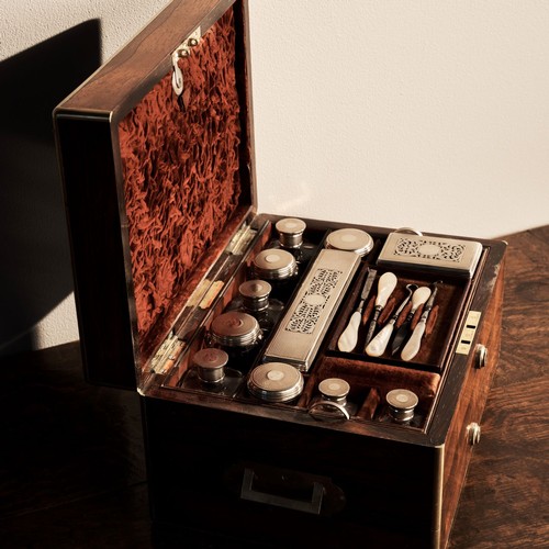 446 - A VICTORIAN BRASS BOUND ROSEWOOD DRESSING CASE, by I Turrill, 250 Regent Street, the fitted interior... 