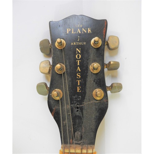 86 - A ‘FRANKENSTEIN’ GUITAR, made as a tongue in cheek instrument from assorted parts bearing the decals... 