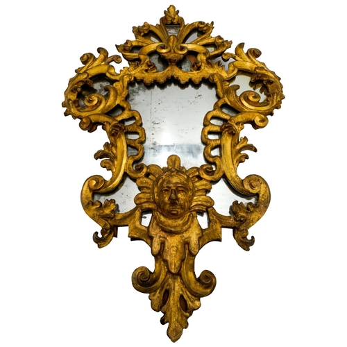 274 - GOOD ITALIAN CARVED GILTWOOD MIRROR18TH CENTURYthe sectional mirrored plates within an ornate carved... 