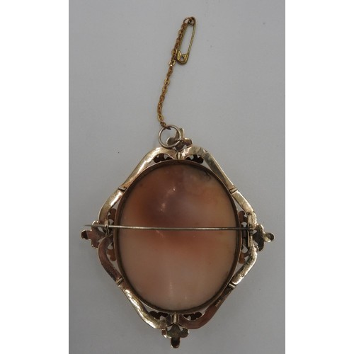 593 - A VICTORIAN GOLD BROOCH MOUNTED WITH OVAL CAMEO DEPICTING THREE GRACES, measuring 6.5 x 7.5cm