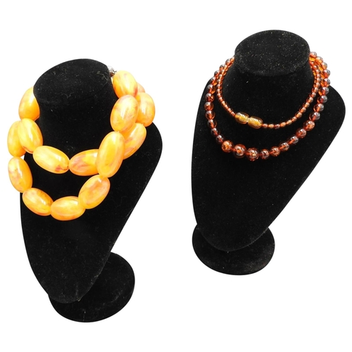 579 - A GRADUATED AMBER BEAD NECKLACE, 46cm, AND AN ELLIPSOID AMBER BEAD NECKLACE, 54cm