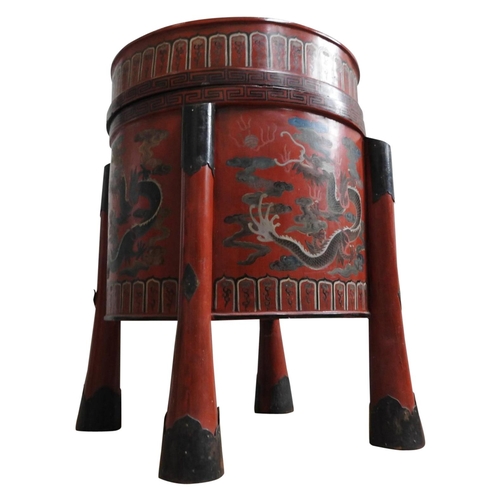 A LARGE JAPANESE RED LACQUER DRUM TABLE / STORAGE BOX, 78cm high, 56cm diameter