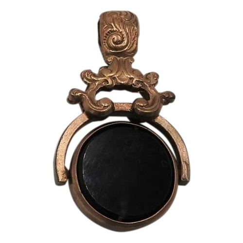 582 - A VICTORIAN SPINNING FOB SET WITH BLOOD STONE, 4cm