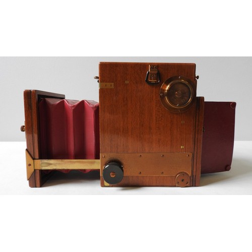 A VINTAGE TROPICAL SOHO REFLEX CAMERA, circa 1925 single lens reflex of ...