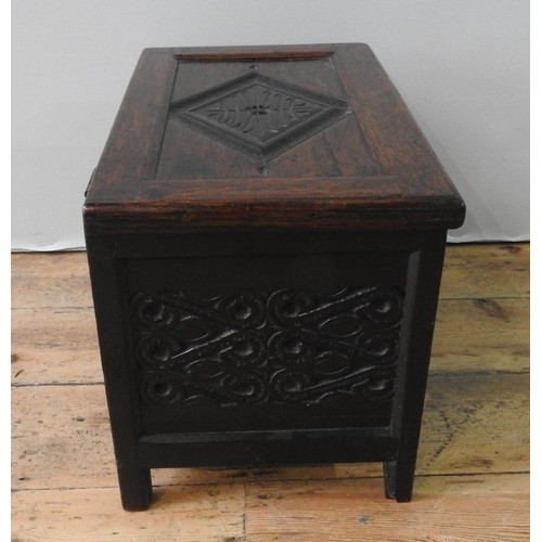 7 - AN 18TH CENTURY OAK ESTATE BOX, of small proportions, the side and front panels carved with scroll w... 