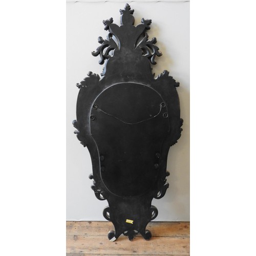 266 - A LARGE 20TH CENTURY CONTINENTAL STYLE WALL GILDED MIRROR, the roccoco style tapered frame decorated... 