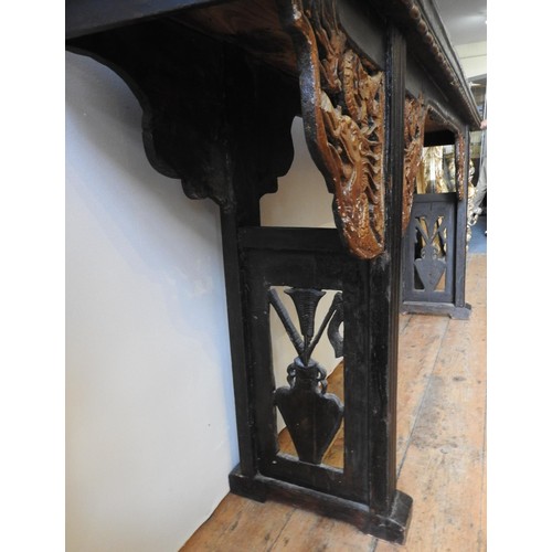 45 - A CHINESE ALTAR TABLE, with ornate carved corner brackets depicting dragons, 93 x 223 x 37.5cm