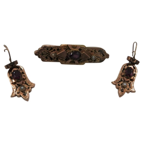 589 - A VICTORIAN AMETHYST AND ENAMEL DECORATED SUITE OF JEWELLERY, comprising a brooch and a pair of earr... 