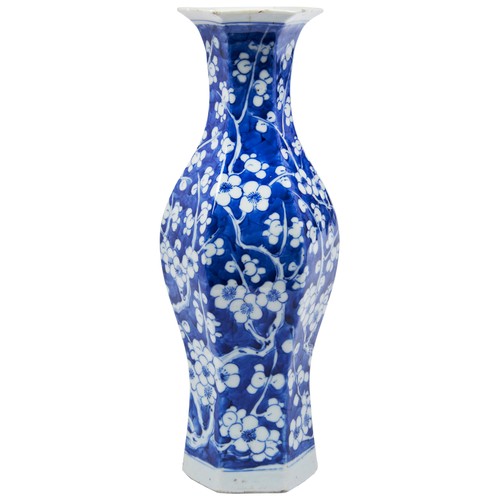 61 - BLUE AND WHITE HEXAGONAL 'CRACKED-ICE' VASEQING DYNASTY, 19TH CENTURYpainted with blossoming prunus ... 