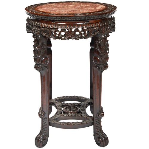 296 - GOOD PAIR OF CARVED HARDWOOD STANDSQING DYNASTY, 19TH CENTURYthe circular tops with inset marble pan... 