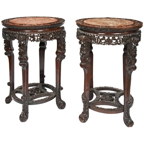 296 - GOOD PAIR OF CARVED HARDWOOD STANDSQING DYNASTY, 19TH CENTURYthe circular tops with inset marble pan... 