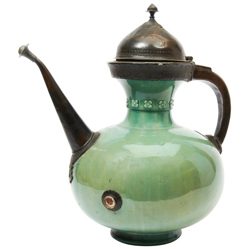 351 - UNUSUAL SAFAVID GREEN-GLAZED EWER17TH / 18TH CENTURYwith later 19th century metal mounts, the large ... 