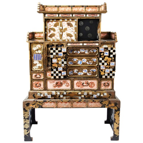 344 - GOOD JAPANESE KUTANI AND IMARI PORCELAIN MOUNTED LACQUER CABINET ON STANDMEIJI PERIOD (1868-1912)the... 