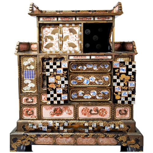 344 - GOOD JAPANESE KUTANI AND IMARI PORCELAIN MOUNTED LACQUER CABINET ON STANDMEIJI PERIOD (1868-1912)the... 