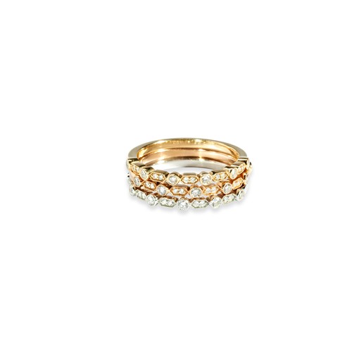 61 - THREE CONTEMPORARY DIAMOND STACKING RINGS each set with millegrain set single and pairs of brilliant... 