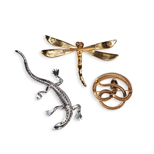 82 - BUTLER AND WILSON BROOCHESThree Butler and Wilson brooches including a coiled snake set with clear p... 