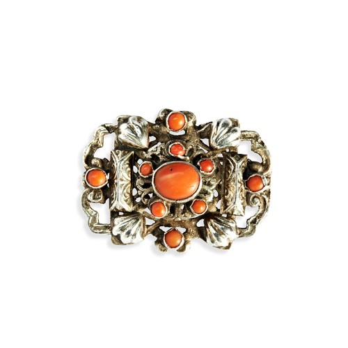 92 - A COLLECTION OF 19TH CENTURY JEWELLERYa red paste, bezel set, filigree cross crafted in white metal.... 