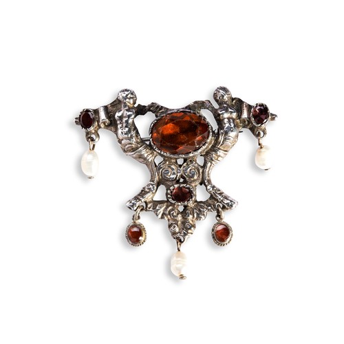 92 - A COLLECTION OF 19TH CENTURY JEWELLERYa red paste, bezel set, filigree cross crafted in white metal.... 