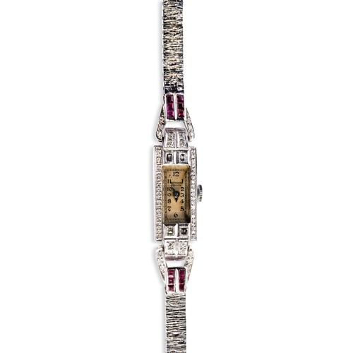 264 - LADY'S RUBY AND DIAMOND COCKTAIL BRACELET WATCH, CIRCA 1920, BY BENSON, LONDON, ON A LATER GOLD STRA... 