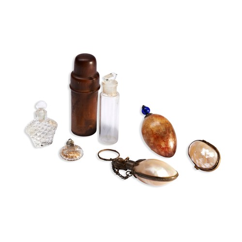 254 - A COLLECTION OF PERFUME BOTTLESincluding a chatelaine bottle created from shell and a small hinged b... 